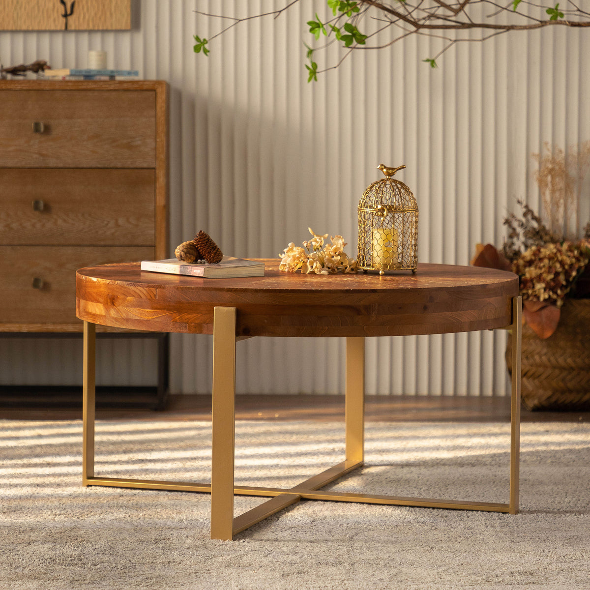 Round fir wood coffee table with gold legs and round top for living room use
