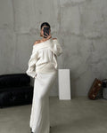 White off-shoulder ribbed knit sweater and matching long skirt set