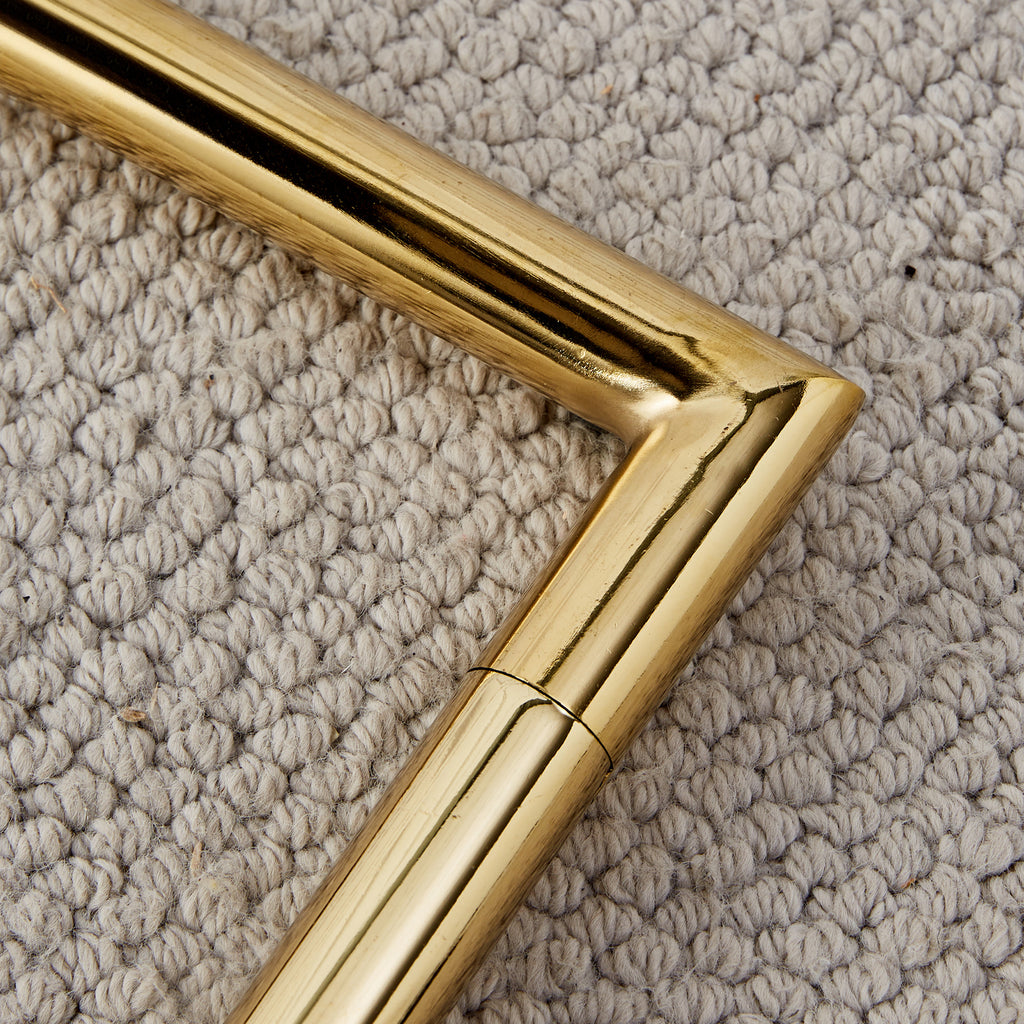 Gold metal sled leg detail