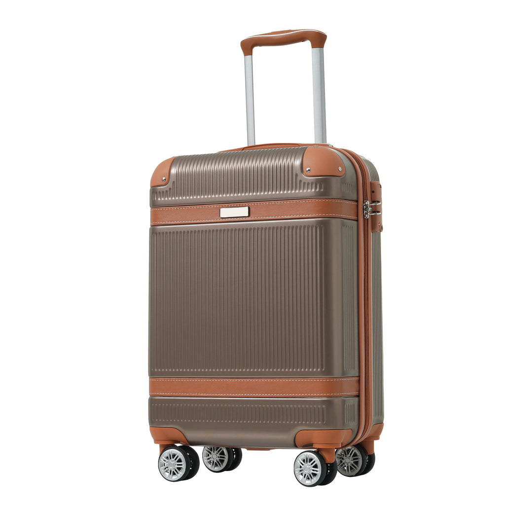 Front view of coppery hardshell carry-on suitcase with four double spinner wheels