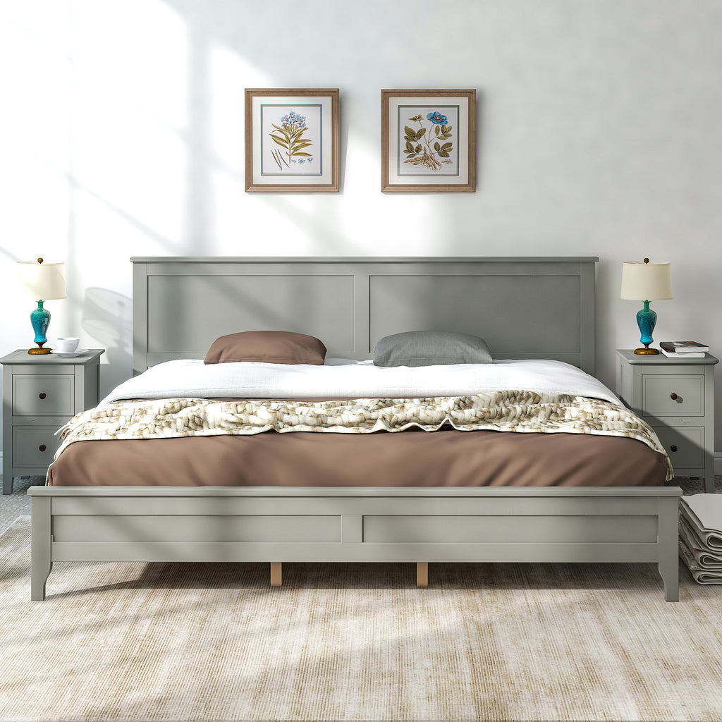 Gray king platform bed with paneled headboard, slatted base, and fitted bedding