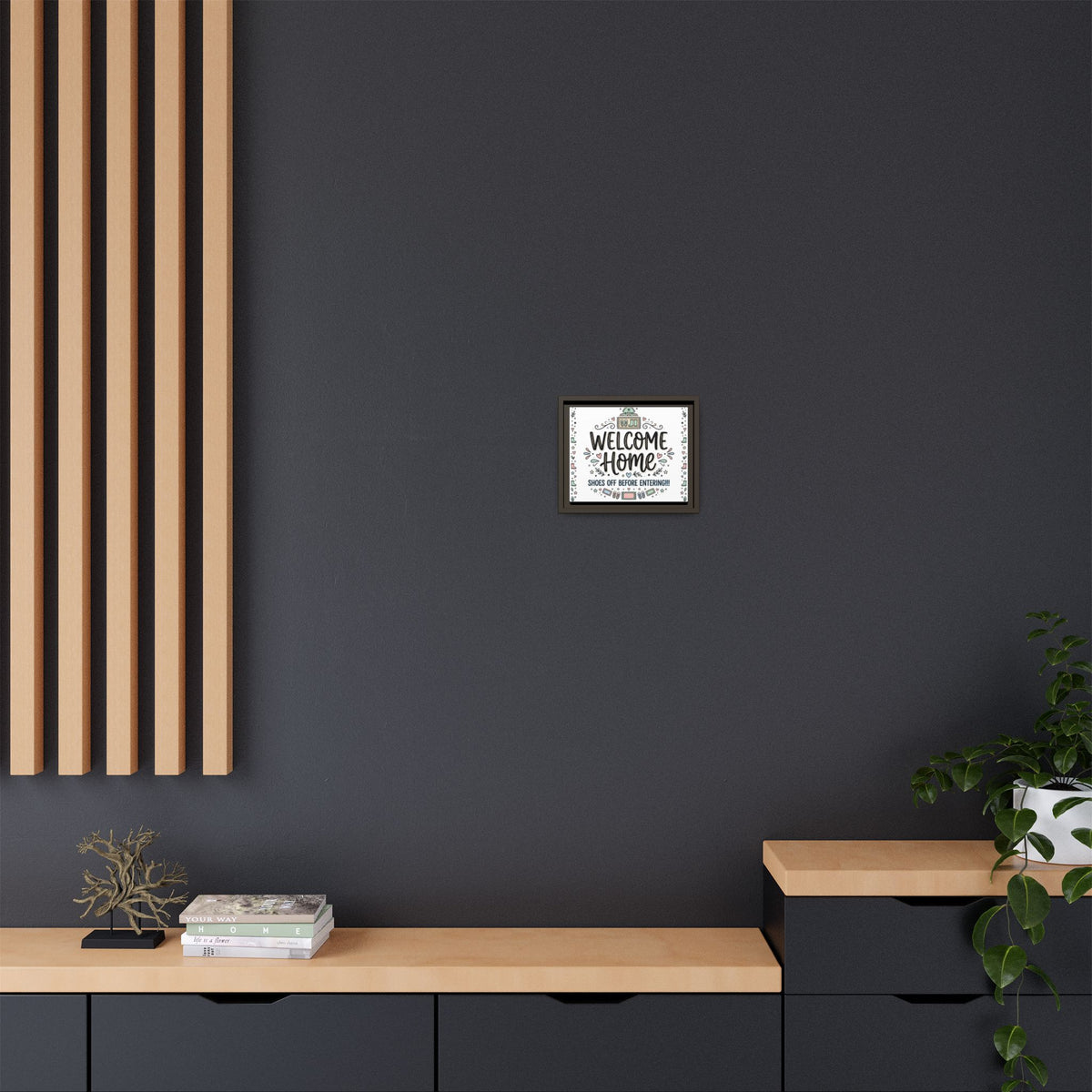 Framed matte canvas “Welcome Home” wall art with dark frame on dark wall