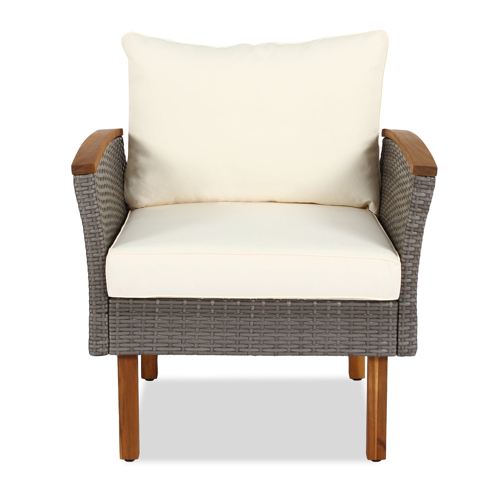 Rattan armchair with beige seat cushion, dark woven sides, and wooden legs
