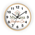 Wood wall clock with light wood frame, black hands, bold black numerals on white face