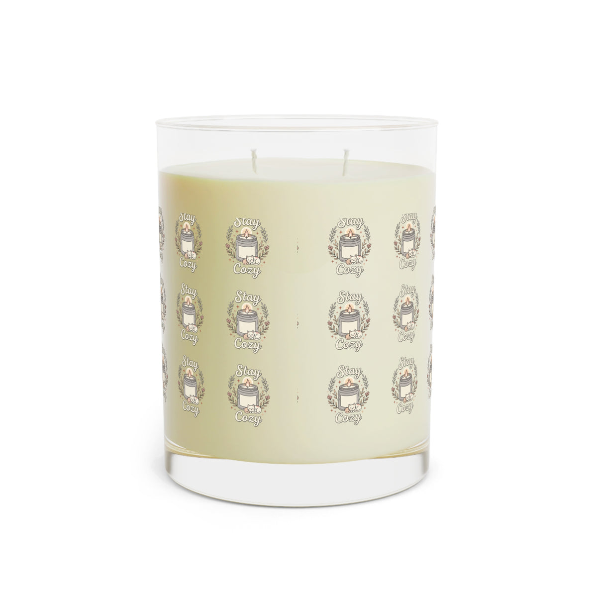Clear glass candle with cream wax and repeating Cozy emblem label pattern