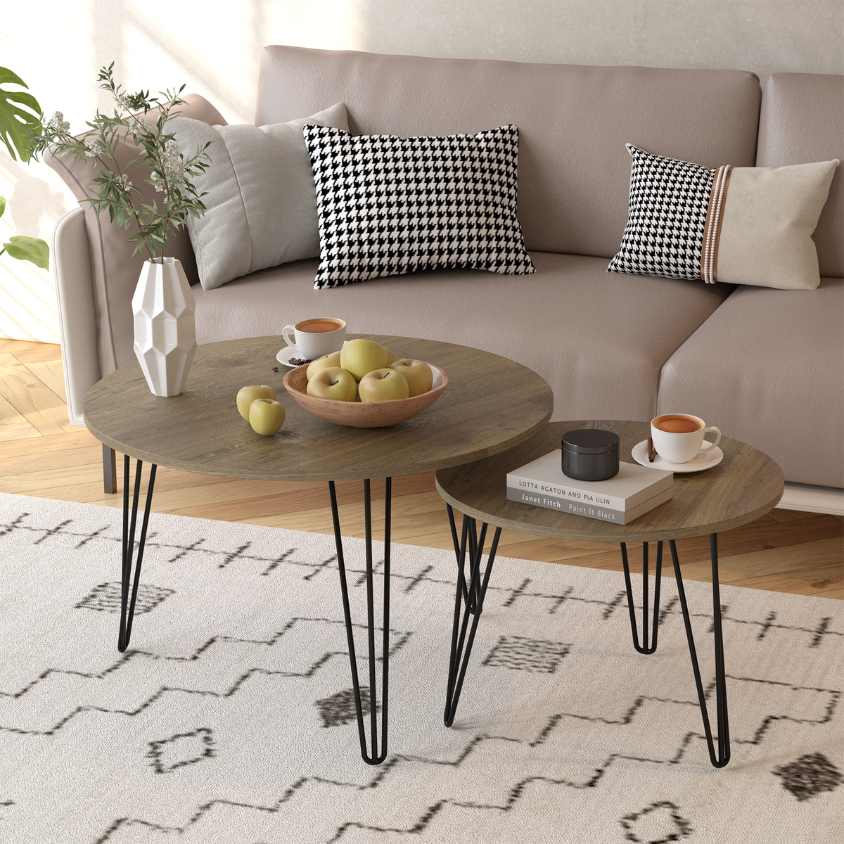 Round nesting coffee table set of 2 with dark wood-look round tops and black metal legs