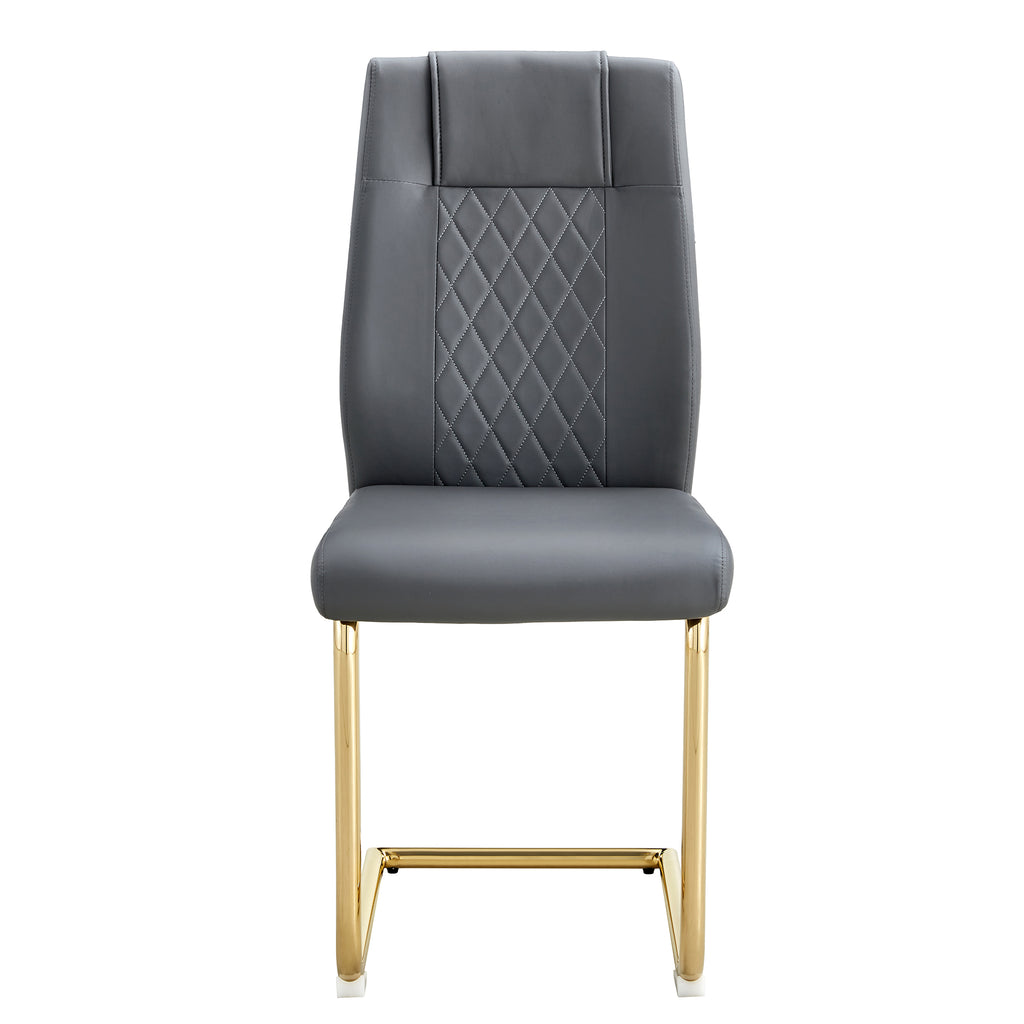 Gray faux leather dining chair with quilted backrest and cushioned seat, gold metal legs.