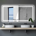 Bathroom LED mirror with white frame and bright perimeter lighting above vanity
