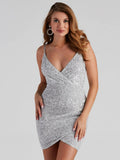 Silver sequined bodycon mini dress with deep V neckline, thin spaghetti straps