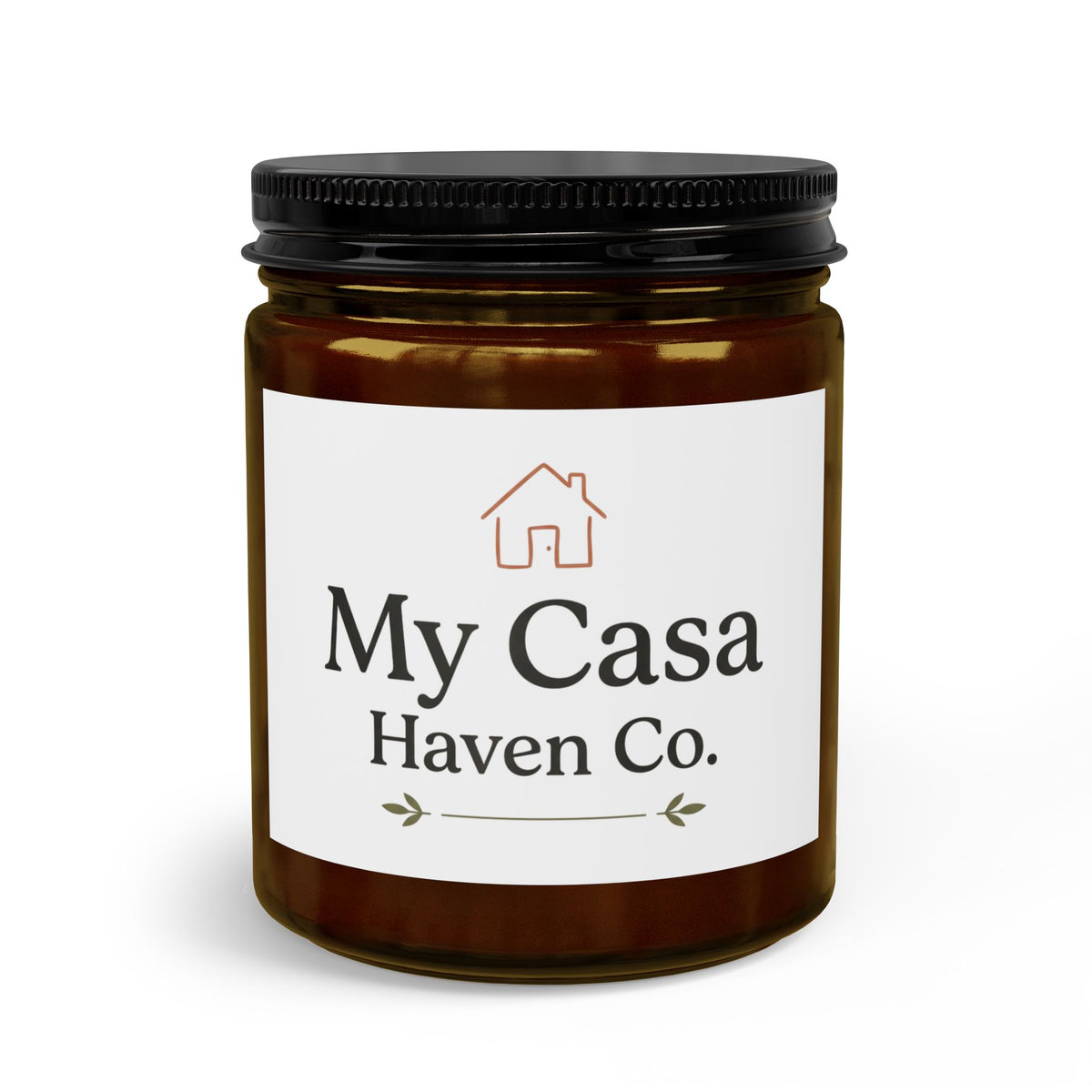 Glass candle jar with black screw lid, amber wax and centered house logo label