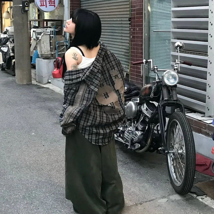 Oversized plaid shirt jacket with exposed back/shoulder cutout, long sleeves