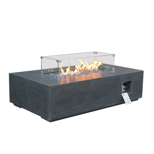 Dark gray rectangular propane fire pit table with glass wind guard, visible burner flames