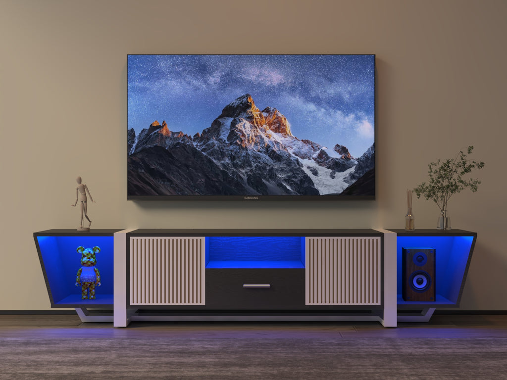 Black TV console with striped cabinet doors, center drawer, and blue-lit center shelf