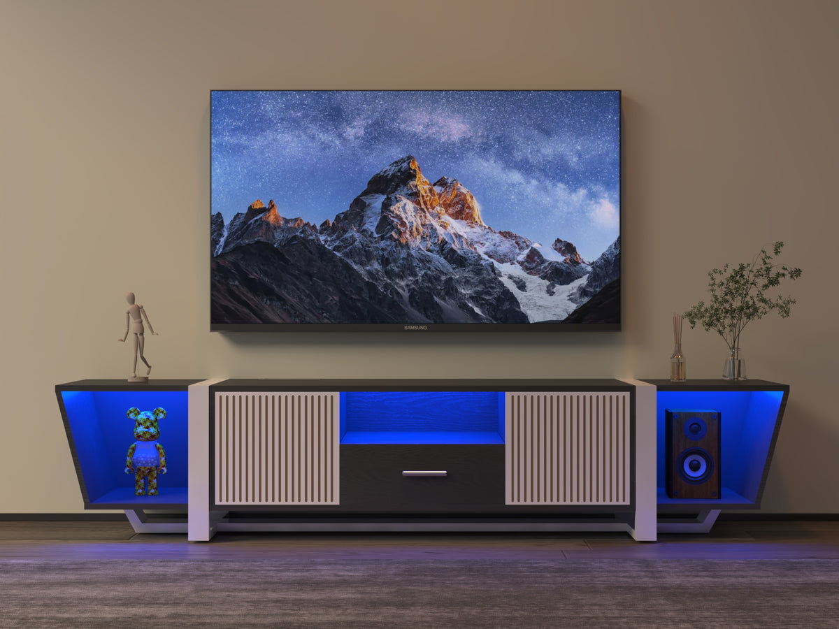 Black TV console with striped cabinet doors, center drawer, and blue-lit center shelf