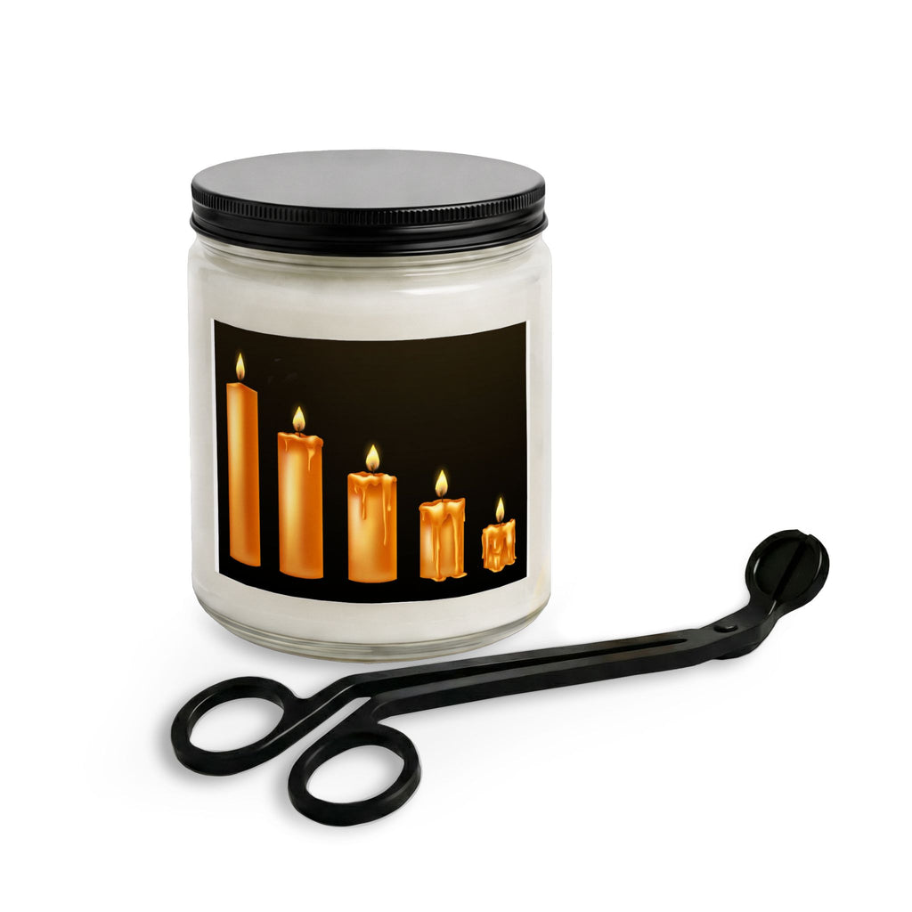 Glass candle set with black lid and black wick trimmer, multiple lit candles in amber wax