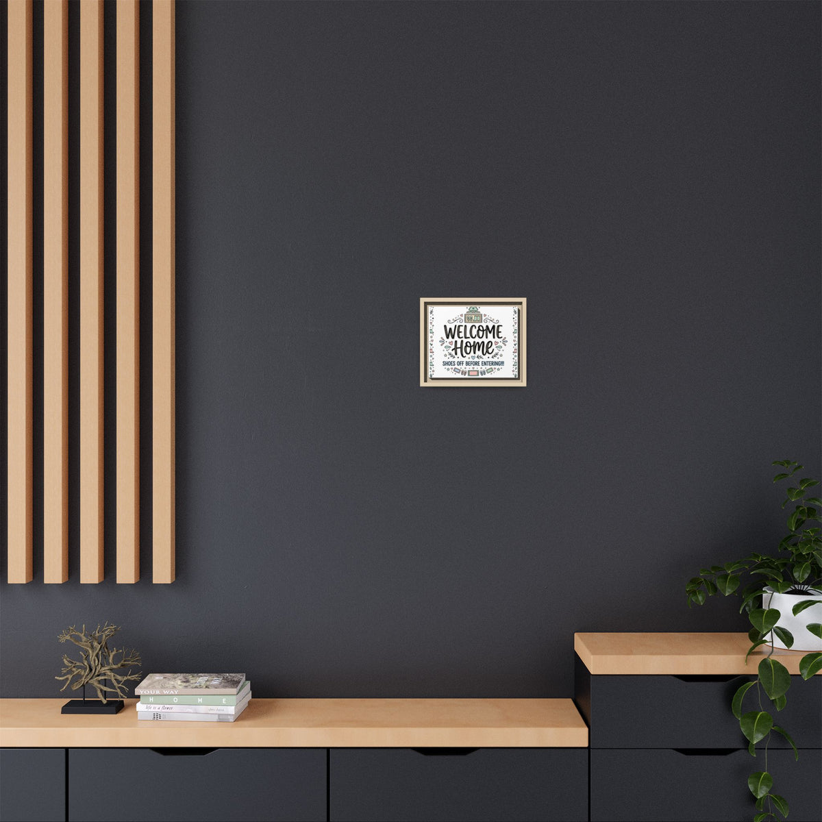 Framed matte canvas wall art reading “Welcome Home”; black frame with shoes-off message.
