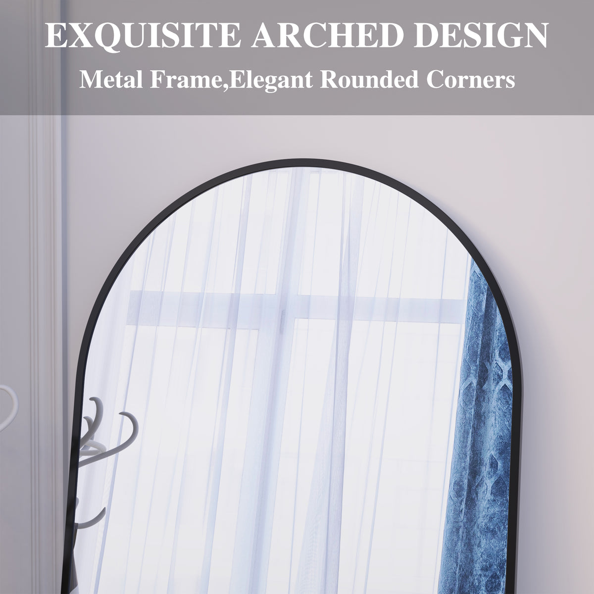 Arched floor mirror close-up with black metal frame and rounded corners.