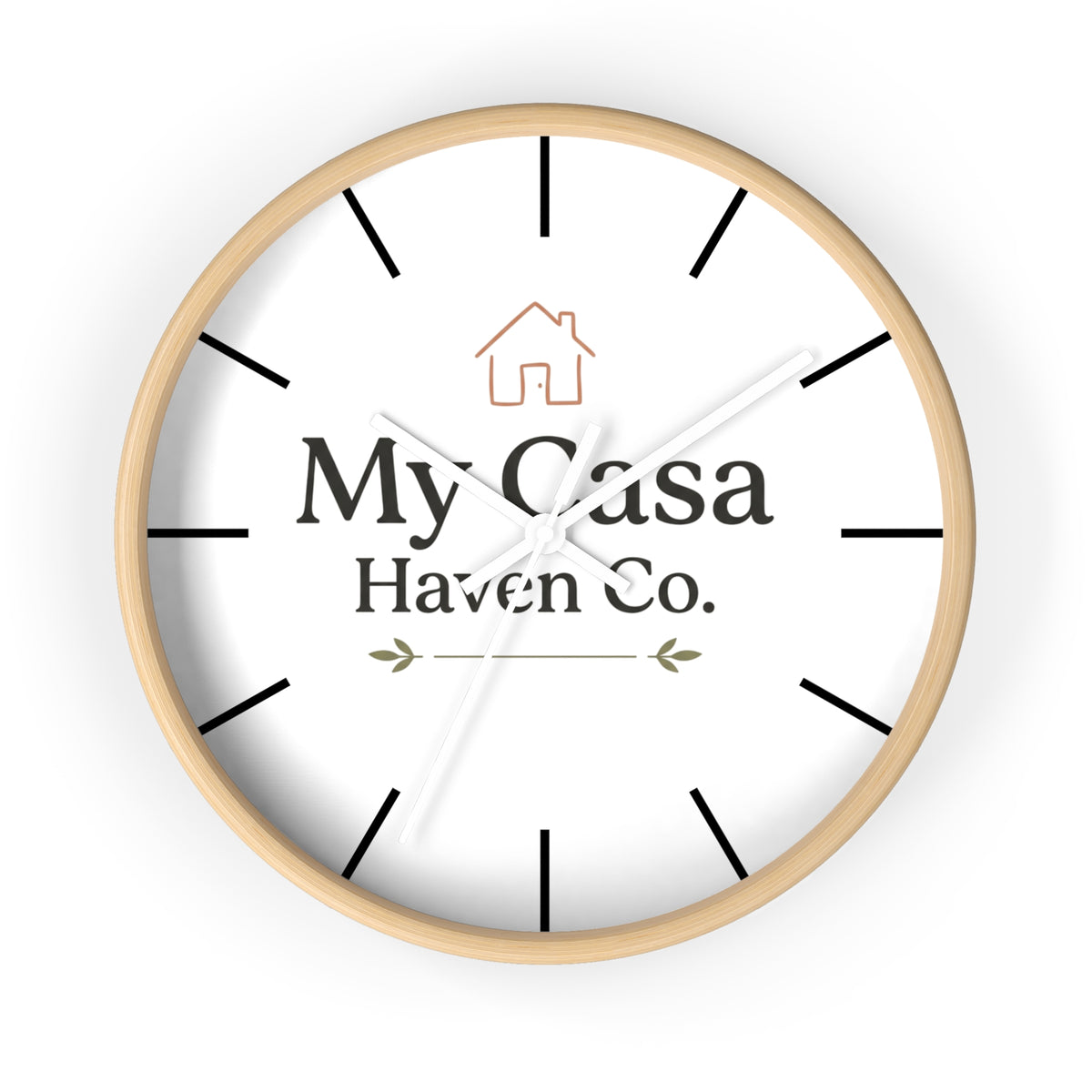 Round wooden wall clock with white dial and white hands, black hour marks.