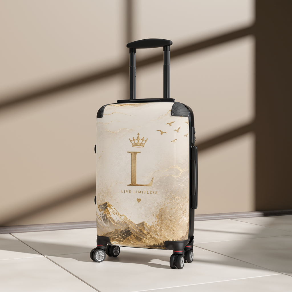 Cream hard-shell suitcase with gold 'L' logo and telescopic handle, on four wheels