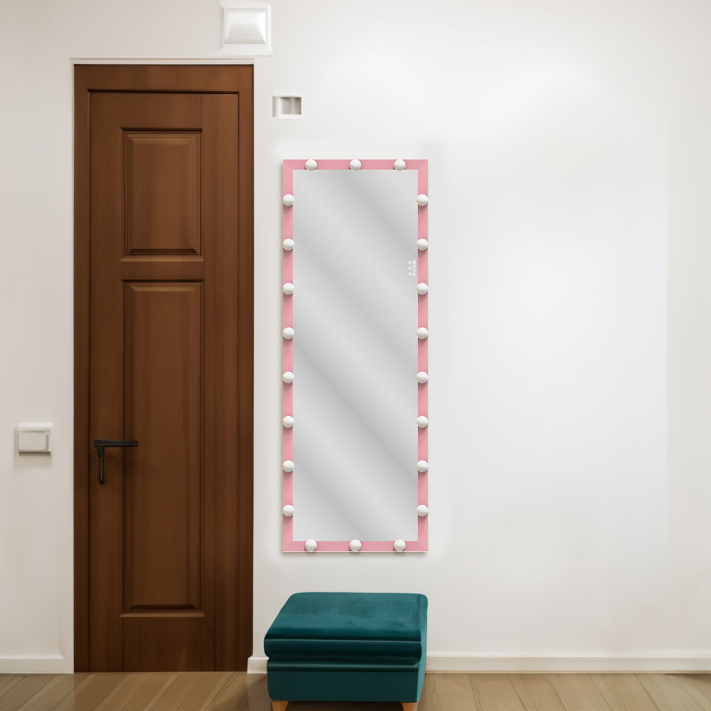 Pink Hollywood vanity mirror with lit bulbs around the full-length frame