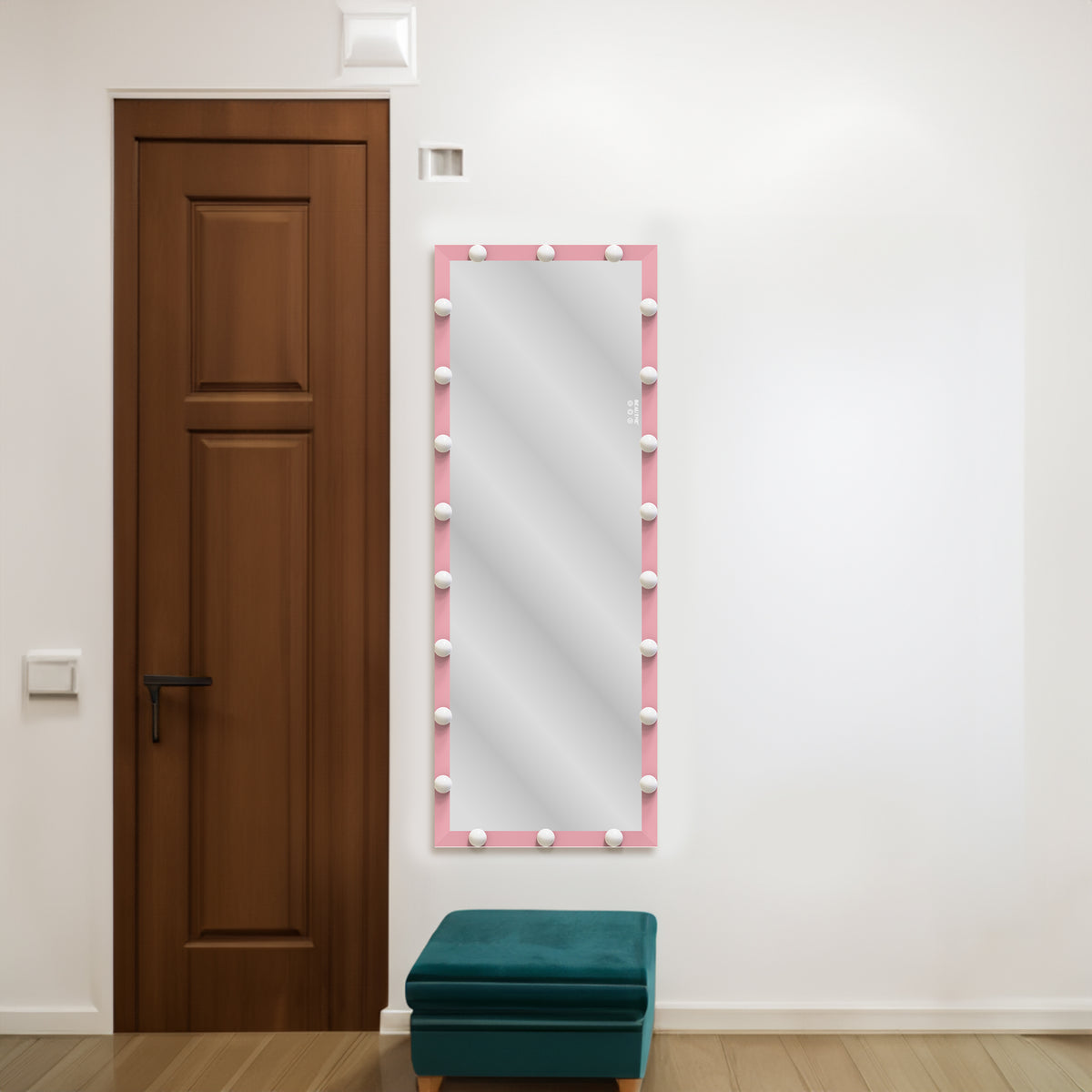 Pink Hollywood vanity mirror with lit bulbs around the full-length frame