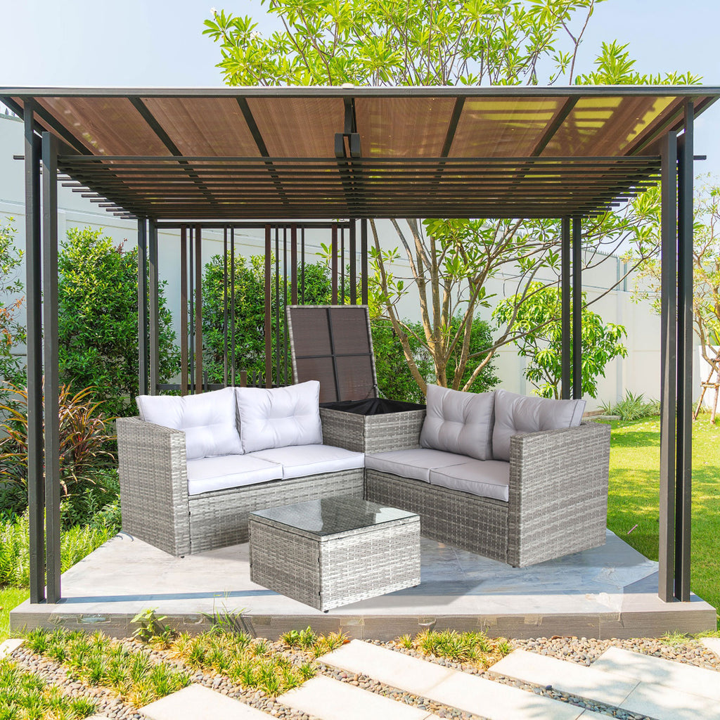 Grey outdoor sectional seating set with white cushions and glass top coffee table