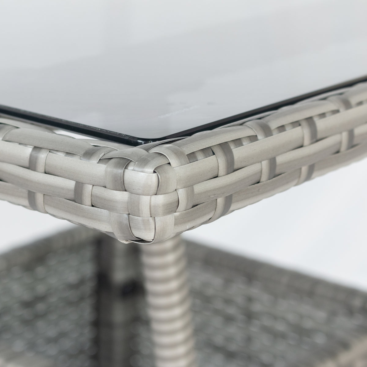 Gray wicker corner joint with metal connector