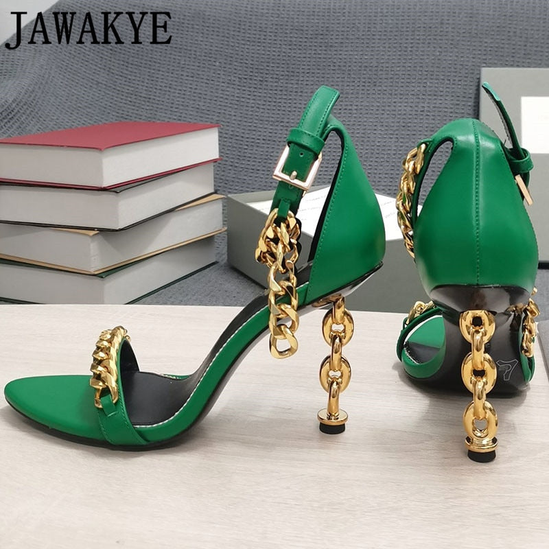 Green metallic high-heel sandals with open toe and gold chain ankle strap