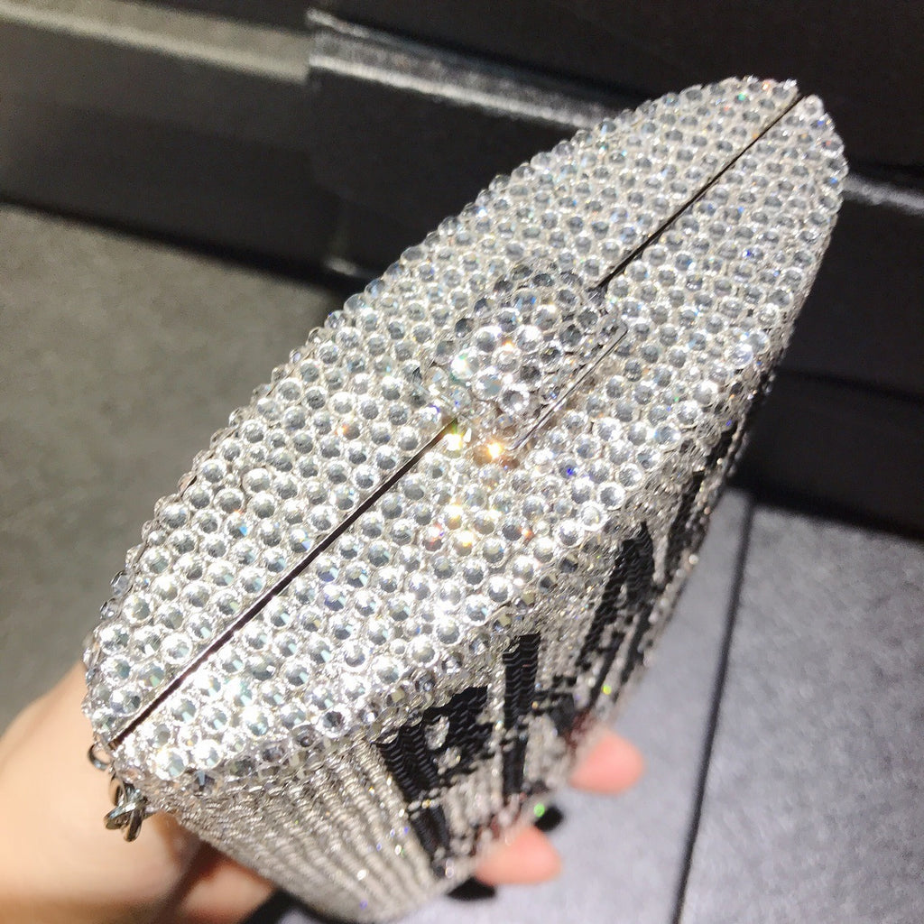 Silver rhinestone mini dinner bag, angled side view with “BLACK LIVES MATTER”