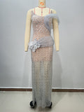 Silver sequined strapless evening dress with draped tulle shoulder and flower applique