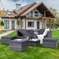 Outdoor dark gray PE wicker patio set with cushions, loveseat, and coffee table