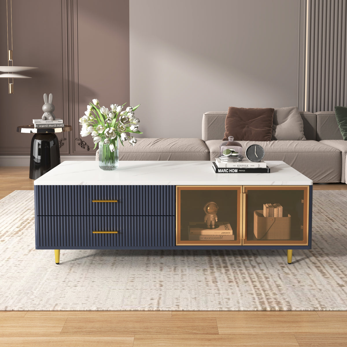 Navy coffee table with glass-door front panel, gold accents, and short gold legs