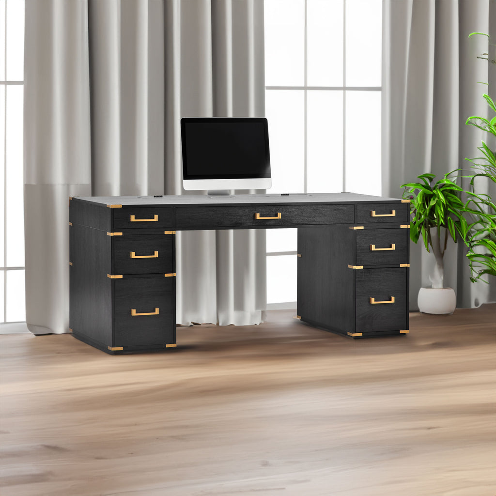 Black desk with gold metal trim, two file drawers, and drawer pulls