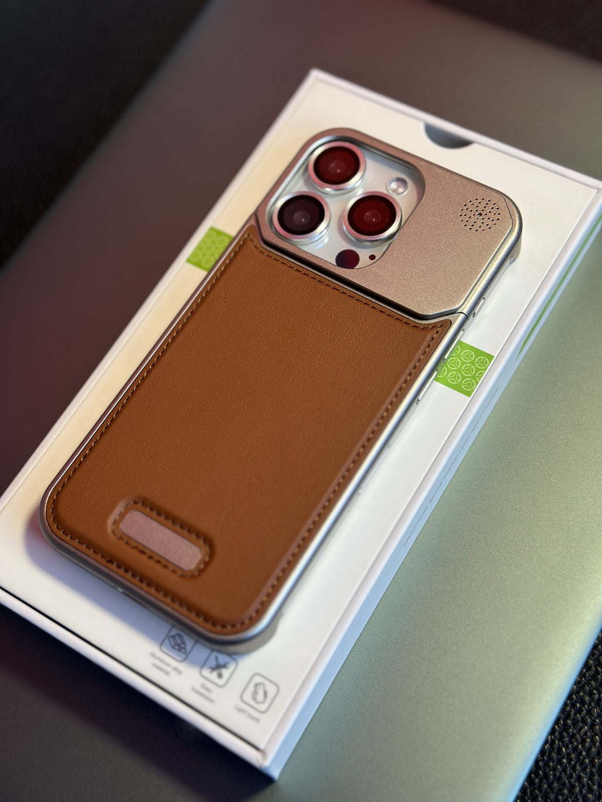 Magnetic aromatherapy phone case, brown leather-style back with camera cutouts, boxed