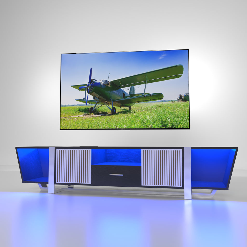 Black TV console with cabinet doors and blue-lit side panels beneath TV
