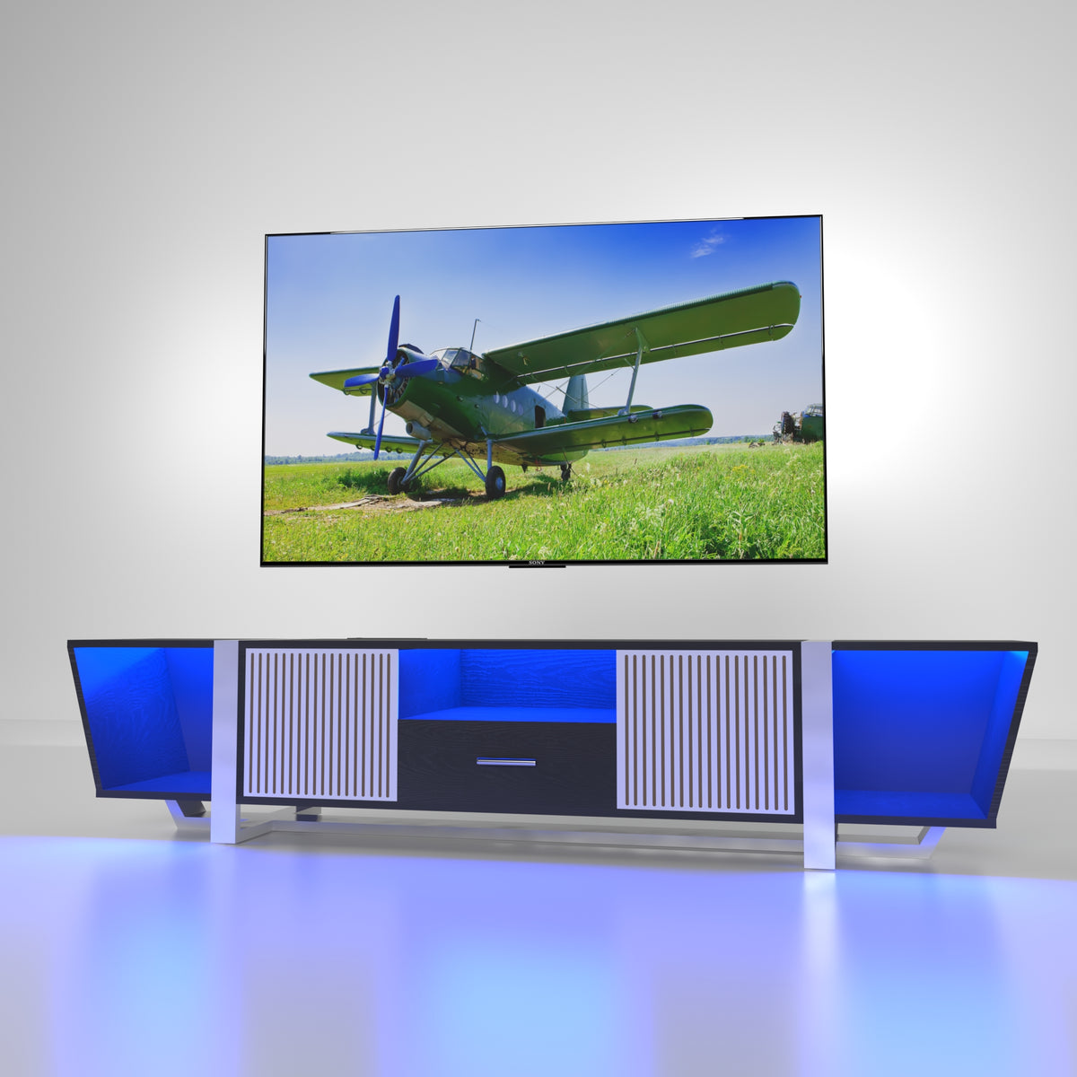 Black TV console with cabinet doors and blue-lit side panels beneath TV