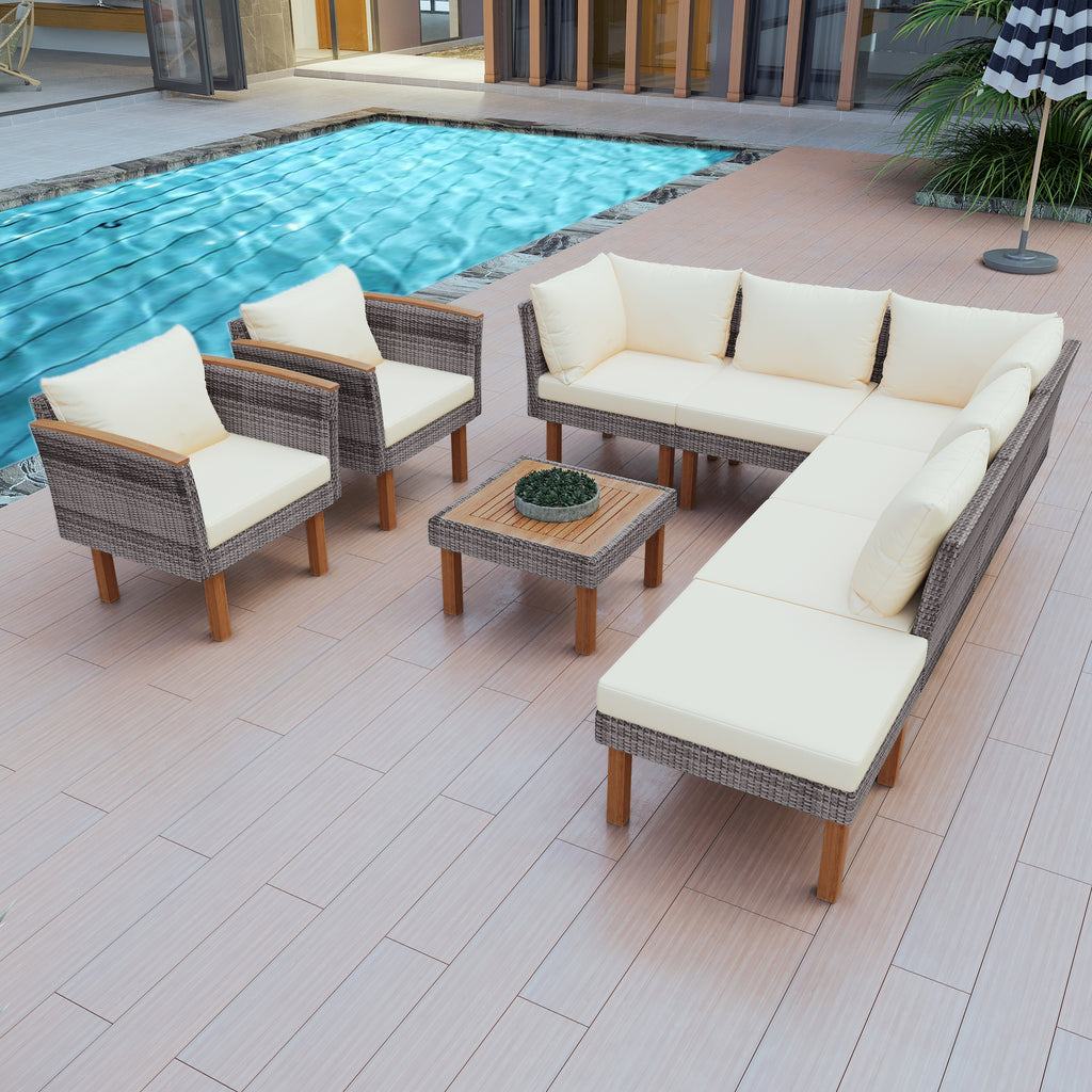 Outdoor rattan patio seating set with beige cushions and dark woven frames