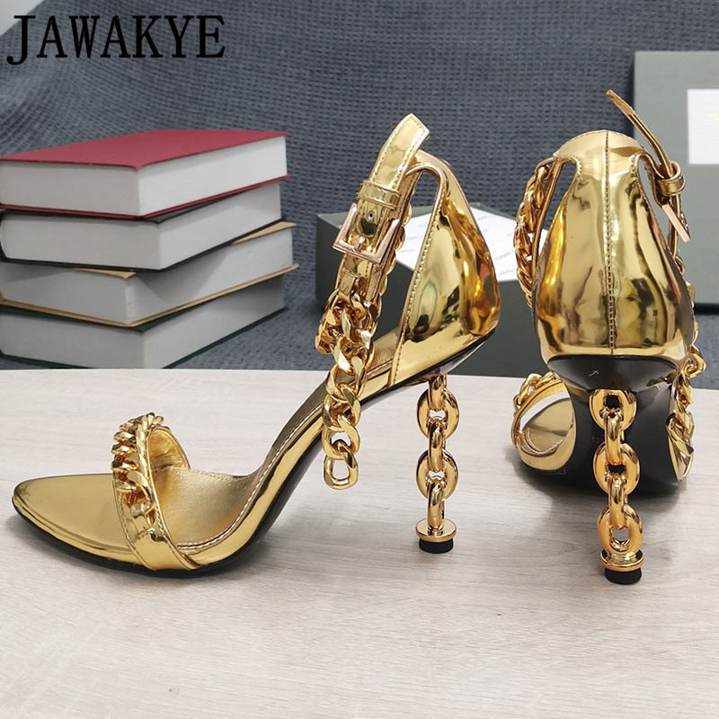 Gold metallic chain heel sandals with ankle strap, open toe, and gold-tone hardware