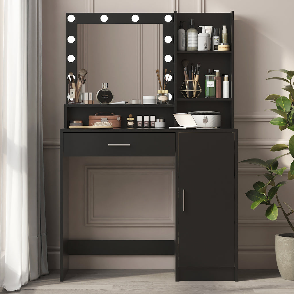 Black vanity desk with lighted mirror, open shelves, and open cabinet door for storage
