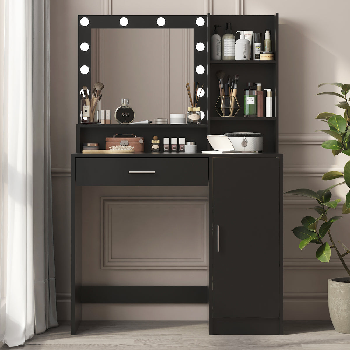 Black vanity desk with lighted mirror, open shelves, and open cabinet door for storage