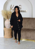 Black V-neck button cardigan with slim pants set, long sleeves and ribbed knit.