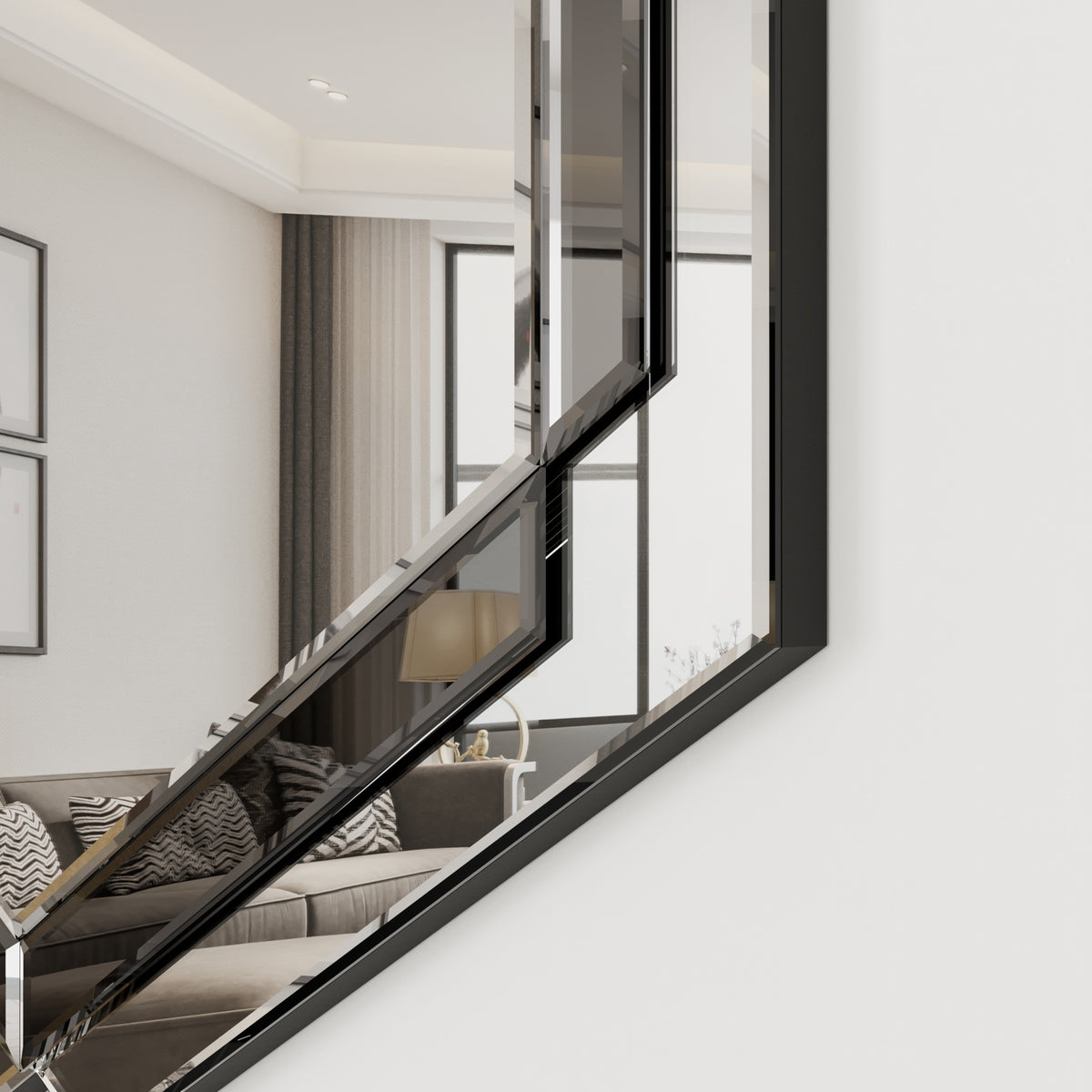 Close-up of silver framed octagon wall mirror showing beveled glass edge
