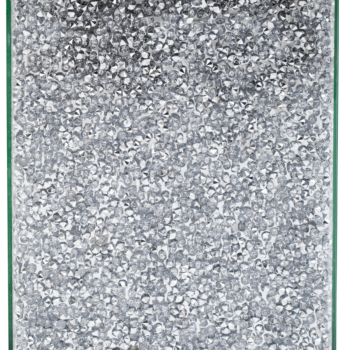 Close-up of silver glitter mirrored panels on a square mirror coffee table