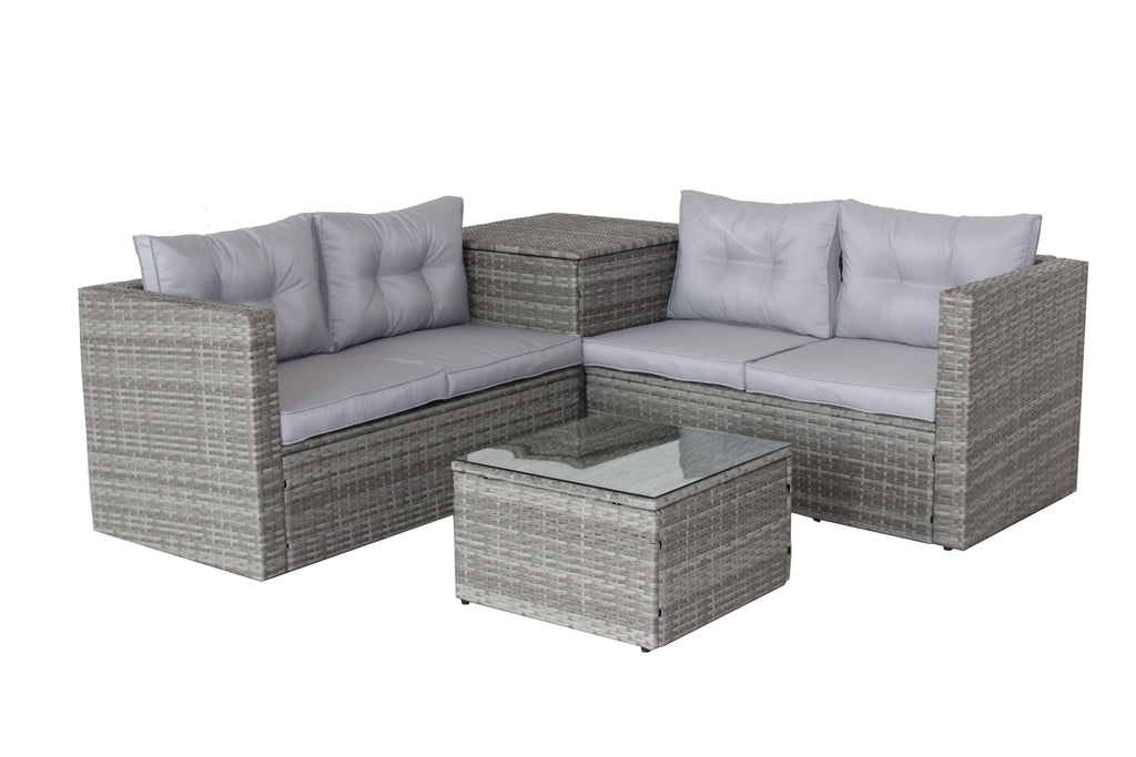 Grey wicker patio sectional with light gray seat cushions and square glass-top coffee ottoman