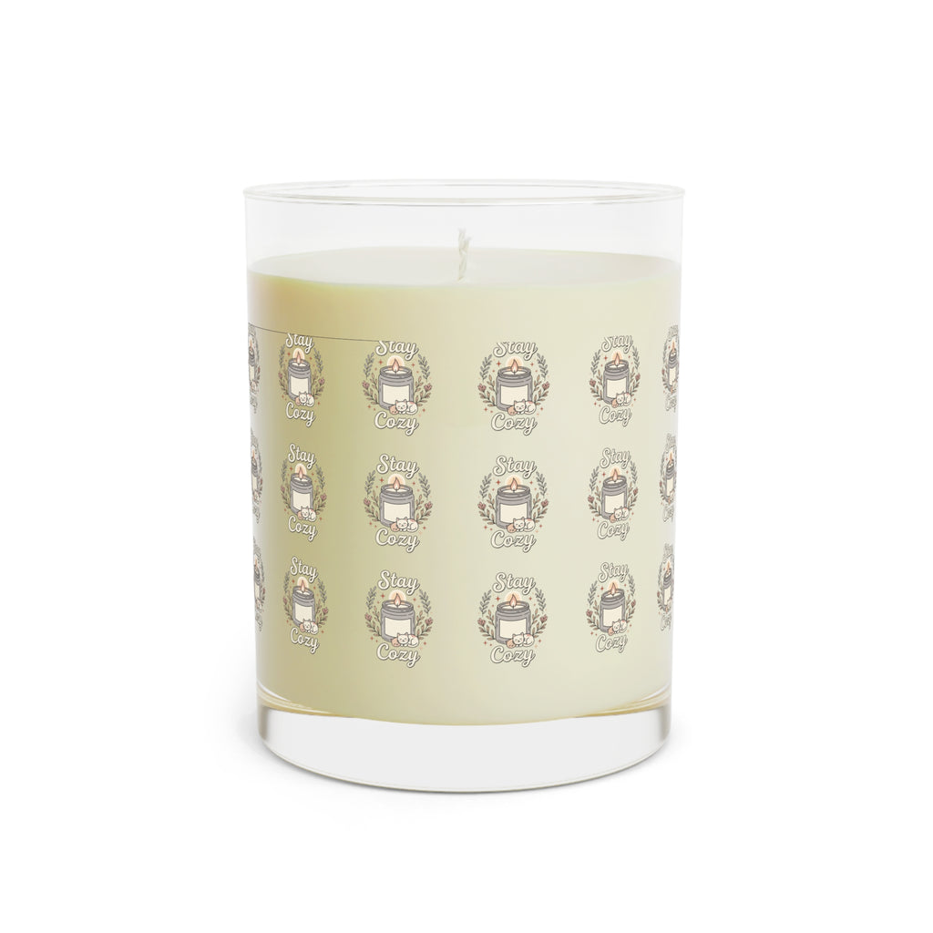 Full clear glass candle with cream wax and repeating Cozy emblem label pattern