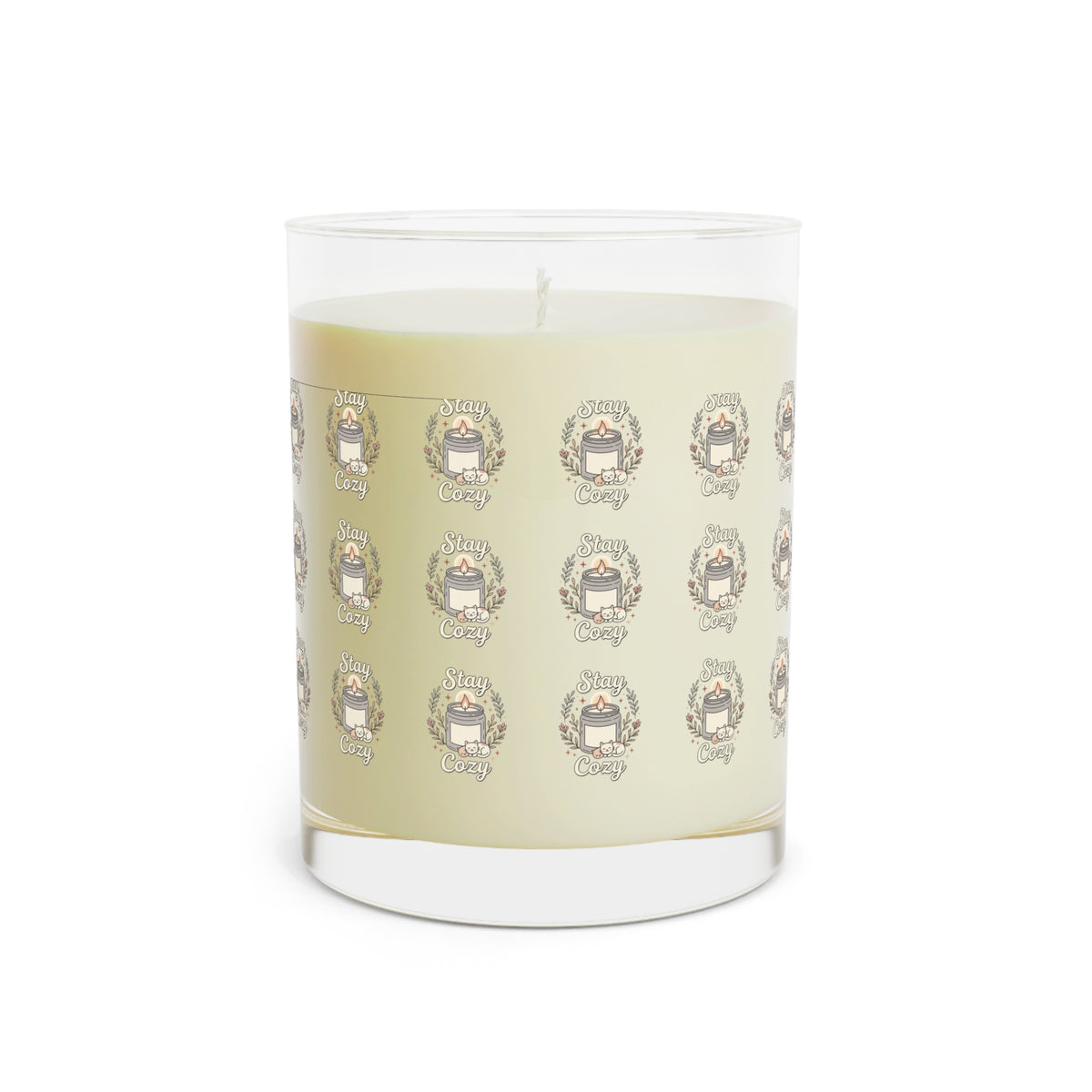 Full clear glass candle with cream wax and repeating Cozy emblem label pattern