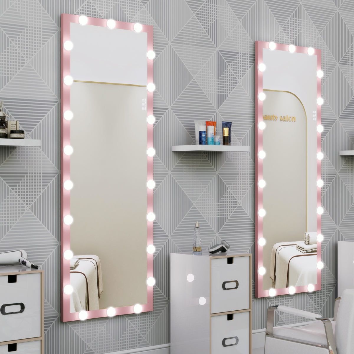 Pink lighted vanity mirrors with bulb borders in a bright room