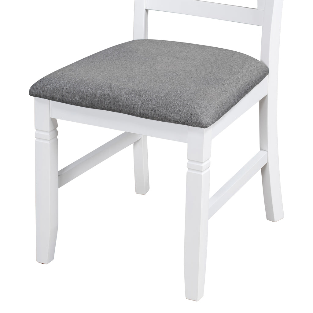 White dining chair with gray upholstered seat cushion and turned wooden legs