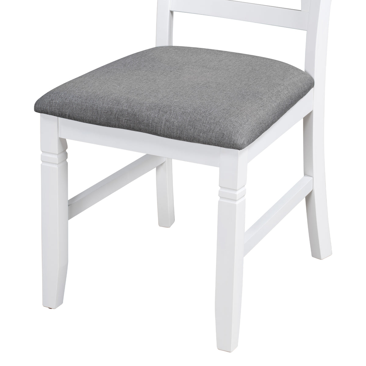 White dining chair with gray upholstered seat cushion and turned wooden legs