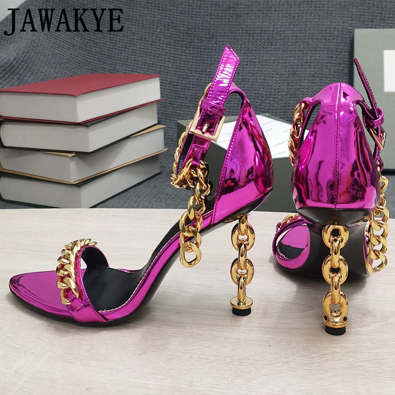 Glossy purple high heel sandal with gold chain ankle strap and stacked heel detail